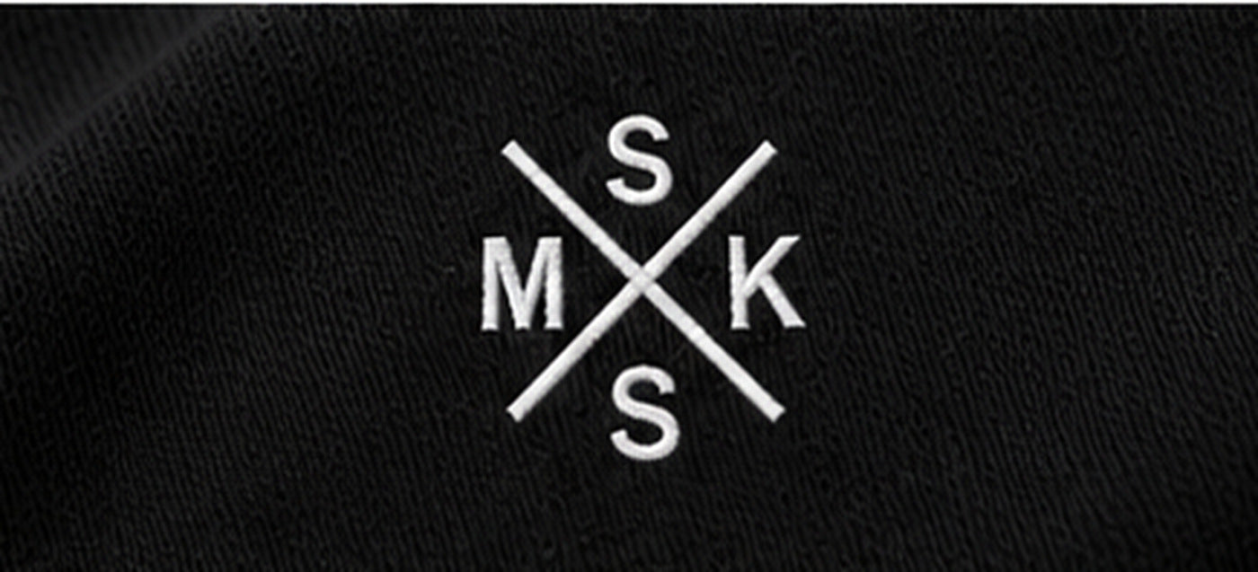 BASE SIGLAS [NEGRO] — Detalle de etiqueta